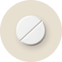 White circular object with a central cutout on a beige background